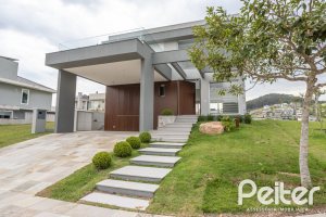 Casa em Condomínio à venda com 331m², 3 dormitórios, 3 suítes, 2 vagas, no bairro Alphaville em PORTO ALEGRE