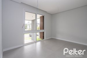 Casa em Condomínio à venda com 331m², 3 dormitórios, 3 suítes, 2 vagas, no bairro Alphaville em PORTO ALEGRE