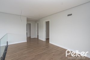 Casa em Condomínio à venda com 331m², 3 dormitórios, 3 suítes, 2 vagas, no bairro Alphaville em PORTO ALEGRE