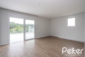 Casa em Condomínio à venda com 331m², 3 dormitórios, 3 suítes, 2 vagas, no bairro Alphaville em PORTO ALEGRE