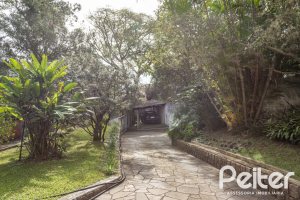 Casa à venda com 395m², 3 dormitórios, 1 suíte, 4 vagas, no bairro Sétimo Céu em Porto Alegre