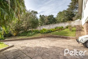 Casa à venda com 395m², 3 dormitórios, 1 suíte, 4 vagas, no bairro Sétimo Céu em Porto Alegre