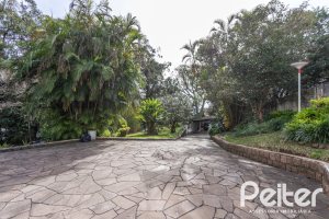 Casa à venda com 395m², 3 dormitórios, 1 suíte, 4 vagas, no bairro Sétimo Céu em Porto Alegre