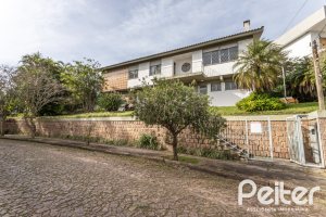 Casa à venda com 395m², 3 dormitórios, 1 suíte, 4 vagas, no bairro Sétimo Céu em Porto Alegre