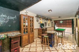 Casa à venda com 231m², 3 dormitórios, 1 suíte, 2 vagas, no bairro Ipanema em Porto Alegre