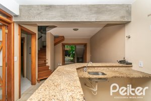 Casa em Condomínio à venda com 279m², 3 dormitórios, 1 suíte, 4 vagas, no bairro Jardim Isabel em Porto Alegre