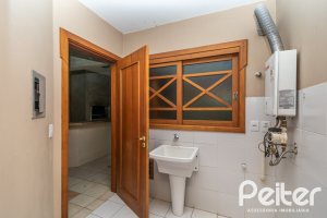 Casa em Condomínio à venda com 279m², 3 dormitórios, 1 suíte, 4 vagas, no bairro Jardim Isabel em Porto Alegre