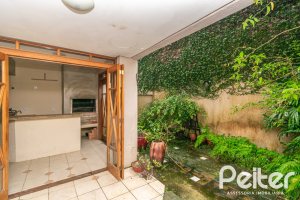 Casa em Condomínio à venda com 279m², 3 dormitórios, 1 suíte, 4 vagas, no bairro Jardim Isabel em Porto Alegre