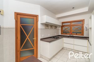 Casa em Condomínio à venda com 279m², 3 dormitórios, 1 suíte, 4 vagas, no bairro Jardim Isabel em Porto Alegre