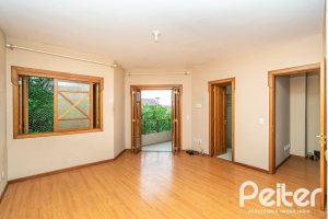 Casa em Condomínio à venda com 279m², 3 dormitórios, 1 suíte, 4 vagas, no bairro Jardim Isabel em Porto Alegre