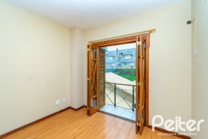 Casa em Condomínio à venda com 279m², 3 dormitórios, 1 suíte, 4 vagas, no bairro Jardim Isabel em Porto Alegre