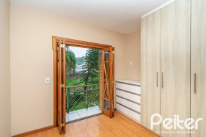 Casa em Condomínio à venda com 279m², 3 dormitórios, 1 suíte, 4 vagas, no bairro Jardim Isabel em Porto Alegre