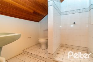 Casa em Condomínio à venda com 279m², 3 dormitórios, 1 suíte, 4 vagas, no bairro Jardim Isabel em Porto Alegre