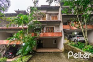 Casa em Condomínio à venda com 279m², 3 dormitórios, 1 suíte, 4 vagas, no bairro Jardim Isabel em Porto Alegre