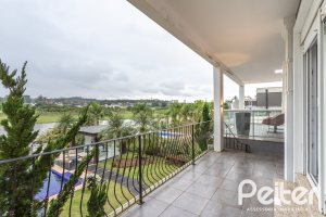 Casa em Condomínio à venda com 592m², 3 dormitórios, 3 suítes, 4 vagas, no bairro Terra Ville em PORTO ALEGRE