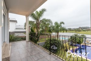 Casa em Condomínio à venda com 592m², 3 dormitórios, 3 suítes, 4 vagas, no bairro Terra Ville em PORTO ALEGRE