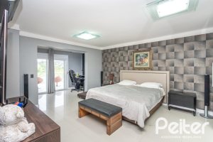 Casa em Condomínio à venda com 592m², 3 dormitórios, 3 suítes, 4 vagas, no bairro Terra Ville em PORTO ALEGRE