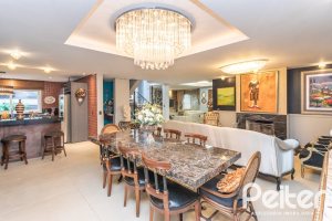Casa em Condomínio à venda com 592m², 3 dormitórios, 3 suítes, 4 vagas, no bairro Terra Ville em PORTO ALEGRE