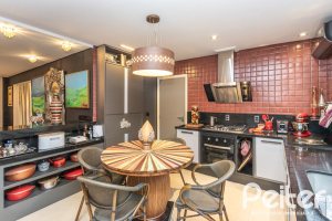 Casa em Condomínio à venda com 592m², 3 dormitórios, 3 suítes, 4 vagas, no bairro Terra Ville em PORTO ALEGRE