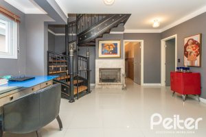 Casa em Condomínio à venda com 592m², 3 dormitórios, 3 suítes, 4 vagas, no bairro Terra Ville em PORTO ALEGRE