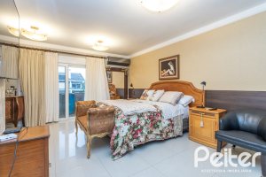 Casa em Condomínio à venda com 592m², 3 dormitórios, 3 suítes, 4 vagas, no bairro Terra Ville em PORTO ALEGRE