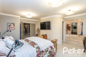 Casa em Condomínio à venda com 592m², 3 dormitórios, 3 suítes, 4 vagas, no bairro Terra Ville em PORTO ALEGRE