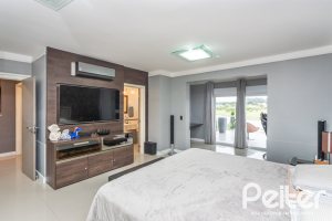 Casa em Condomínio à venda com 592m², 3 dormitórios, 3 suítes, 4 vagas, no bairro Terra Ville em PORTO ALEGRE
