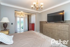 Casa em Condomínio à venda com 592m², 3 dormitórios, 3 suítes, 4 vagas, no bairro Terra Ville em PORTO ALEGRE