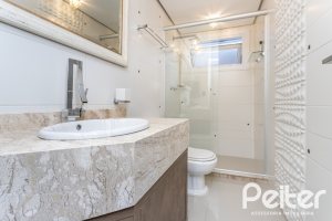 Casa em Condomínio à venda com 592m², 3 dormitórios, 3 suítes, 4 vagas, no bairro Terra Ville em PORTO ALEGRE