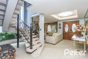 Casa em Condomínio à venda com 592m², 3 dormitórios, 3 suítes, 4 vagas, no bairro Terra Ville em PORTO ALEGRE