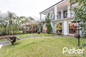 Casa em Condomínio à venda com 592m², 3 dormitórios, 3 suítes, 4 vagas, no bairro Terra Ville em PORTO ALEGRE