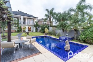 Casa em Condomínio à venda com 592m², 3 dormitórios, 3 suítes, 4 vagas, no bairro Terra Ville em PORTO ALEGRE