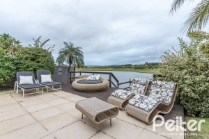 Casa em Condomínio à venda com 592m², 3 dormitórios, 3 suítes, 4 vagas, no bairro Terra Ville em PORTO ALEGRE