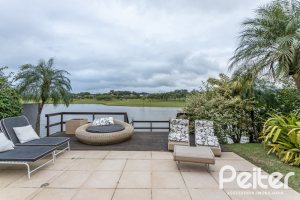 Casa em Condomínio à venda com 592m², 3 dormitórios, 3 suítes, 4 vagas, no bairro Terra Ville em PORTO ALEGRE