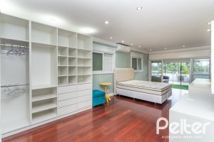 Casa em Condomínio à venda com 506m², 4 dormitórios, 4 suítes, 4 vagas, no bairro Terra Ville em Porto Alegre