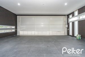 Casa em Condomínio à venda com 506m², 4 dormitórios, 4 suítes, 4 vagas, no bairro Terra Ville em Porto Alegre