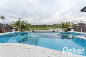 Casa em Condomínio à venda com 506m², 4 dormitórios, 4 suítes, 4 vagas, no bairro Terra Ville em Porto Alegre