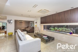 Casa em Condomínio à venda com 506m², 4 dormitórios, 4 suítes, 4 vagas, no bairro Terra Ville em Porto Alegre