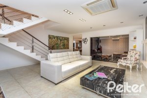 Casa em Condomínio à venda com 506m², 4 dormitórios, 4 suítes, 4 vagas, no bairro Terra Ville em Porto Alegre