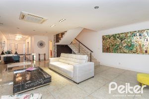 Casa em Condomínio à venda com 506m², 4 dormitórios, 4 suítes, 4 vagas, no bairro Terra Ville em Porto Alegre