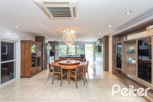 Casa em Condomínio à venda com 506m², 4 dormitórios, 4 suítes, 4 vagas, no bairro Terra Ville em Porto Alegre