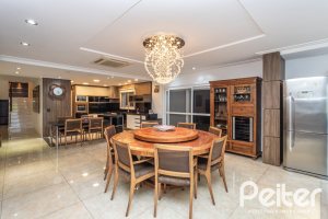 Casa em Condomínio à venda com 506m², 4 dormitórios, 4 suítes, 4 vagas, no bairro Terra Ville em Porto Alegre