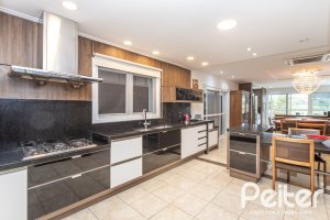 Casa em Condomínio à venda com 506m², 4 dormitórios, 4 suítes, 4 vagas, no bairro Terra Ville em Porto Alegre