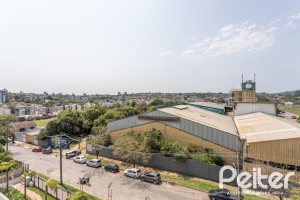 Apartamento à venda com 59m², 2 dormitórios, 1 suíte, 1 vaga, no bairro Jardim do Salso em Porto Alegre