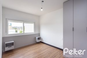 Apartamento à venda com 59m², 2 dormitórios, 1 suíte, 1 vaga, no bairro Jardim do Salso em Porto Alegre