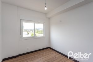 Apartamento à venda com 59m², 2 dormitórios, 1 suíte, 1 vaga, no bairro Jardim do Salso em Porto Alegre