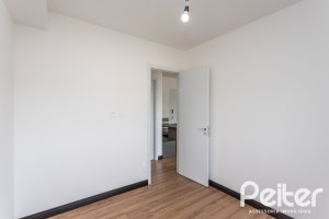 Apartamento à venda com 59m², 2 dormitórios, 1 suíte, 1 vaga, no bairro Jardim do Salso em Porto Alegre