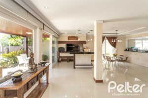 Casa em Condomínio à venda com 386m², 4 dormitórios, 4 suítes, 4 vagas, no bairro Terra Ville em PORTO ALEGRE