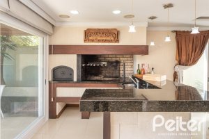 Casa em Condomínio à venda com 386m², 4 dormitórios, 4 suítes, 4 vagas, no bairro Terra Ville em PORTO ALEGRE