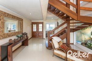 Casa em Condomínio à venda com 386m², 4 dormitórios, 4 suítes, 4 vagas, no bairro Terra Ville em PORTO ALEGRE